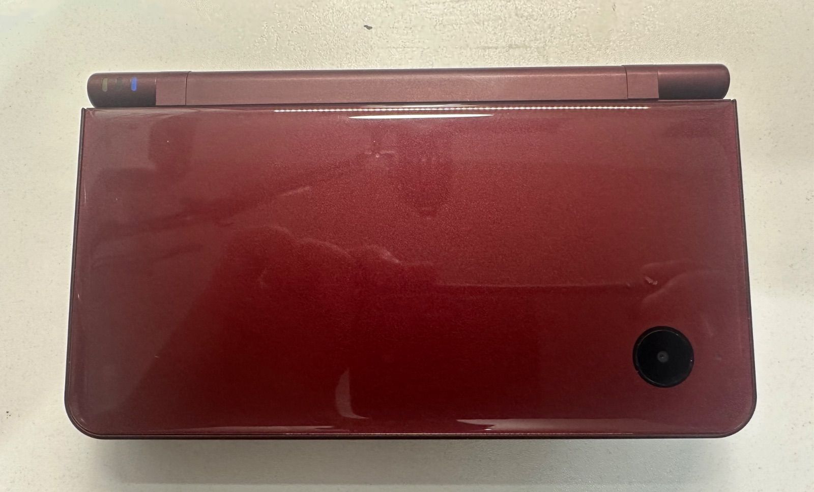 ①Nintendo DSiLL ワインレッド