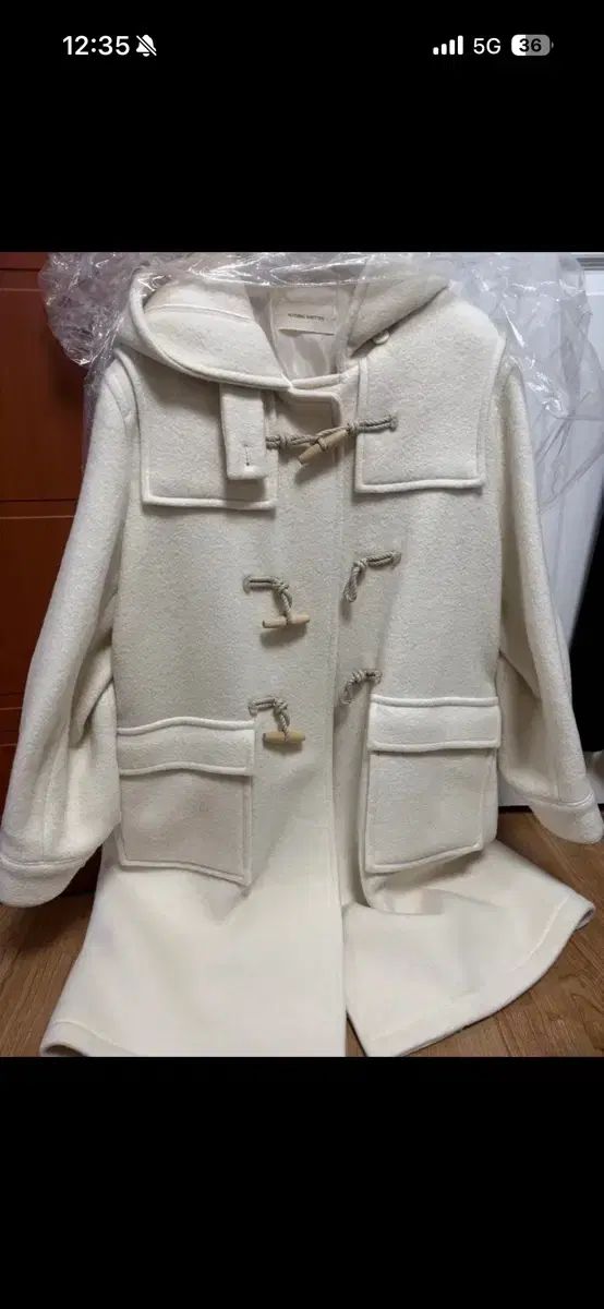 ナッシングリトゥン ダッフルコート アイボリー 34,573円