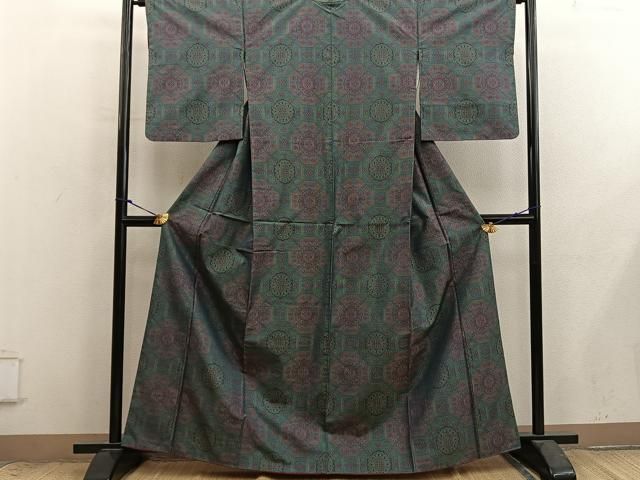 新品仕付け付き解き 逸品 本場大島紬 7マルキ ポップな枝花文 