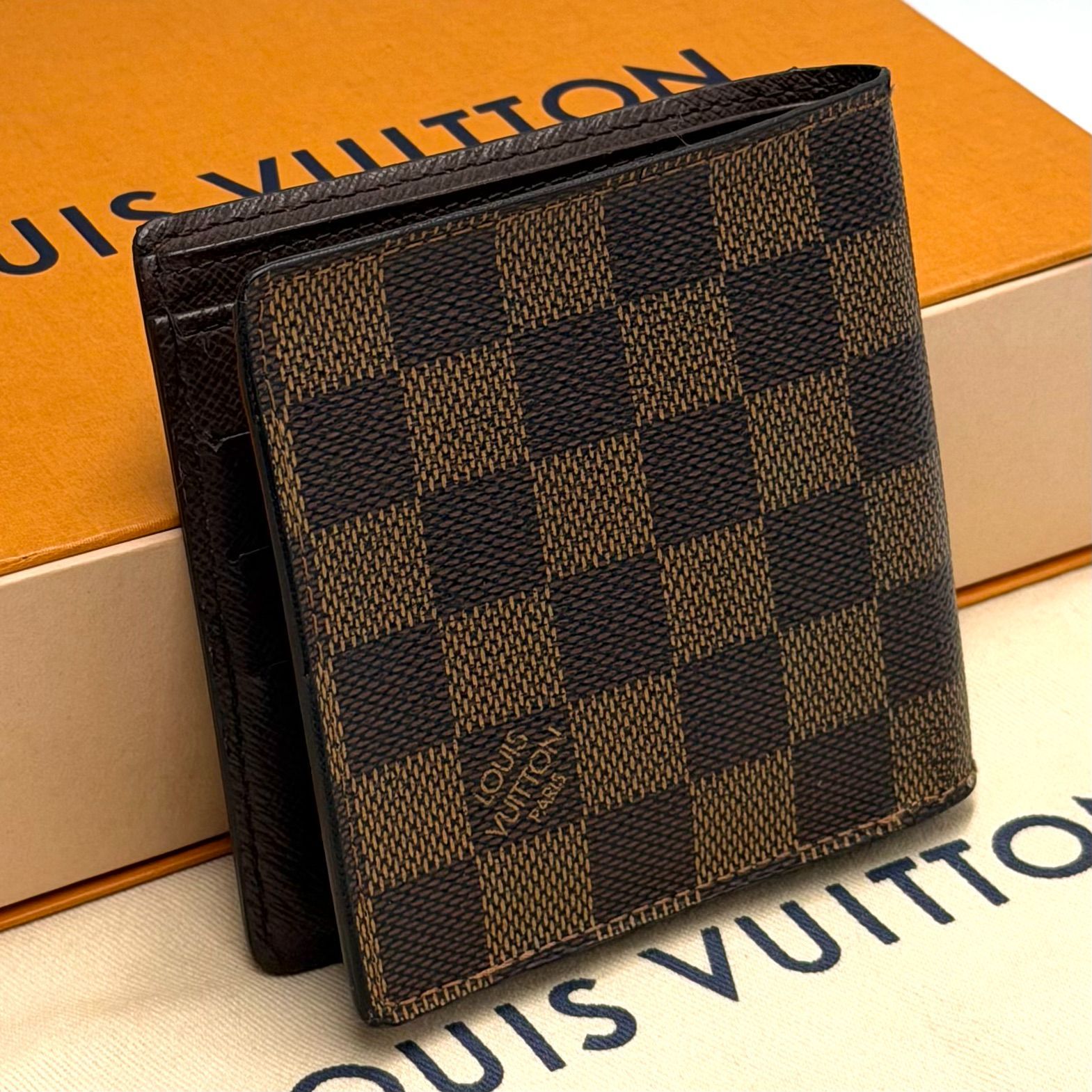 ルイヴィトン LOUIS VUITTON ダミエ エベヌ ポルトビエ カルトクレディモネ 二つ折り財布 コンパクト お札入れ 男女兼用 ブラウン レザー 14,630円