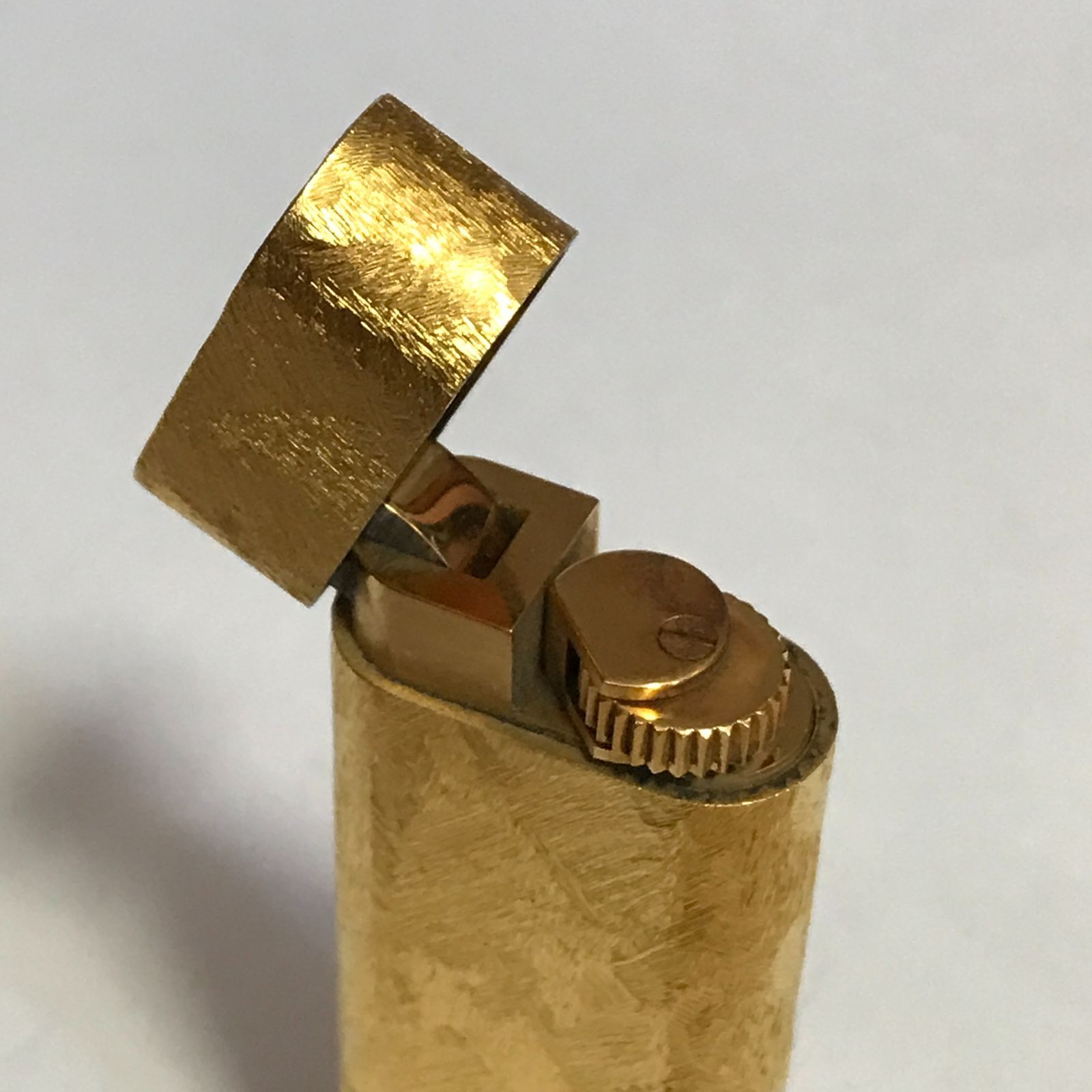 【美品】カルティエCartier ガスライター オーバル バーク仕上げ ゴールド 希少デザイン】カルティエ Cartier オーバル ガスライター 樹皮バーク