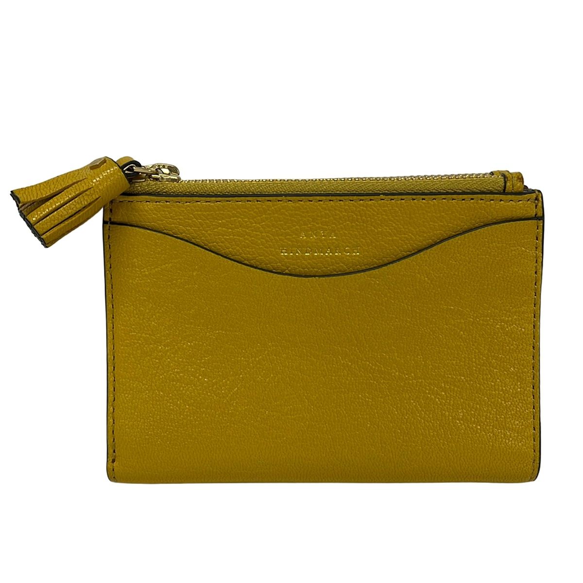 Anya Hindmarch(アニヤハインドマーチ) 2つ折り財布美品 ピーピング アイズ ダークイエロー タッセル レザー