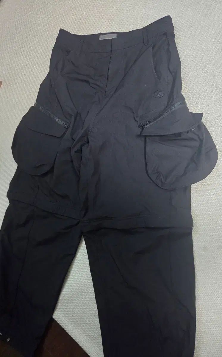 サンサンギアー ツーウェイ ポケット パンツ ブラック - 24SS