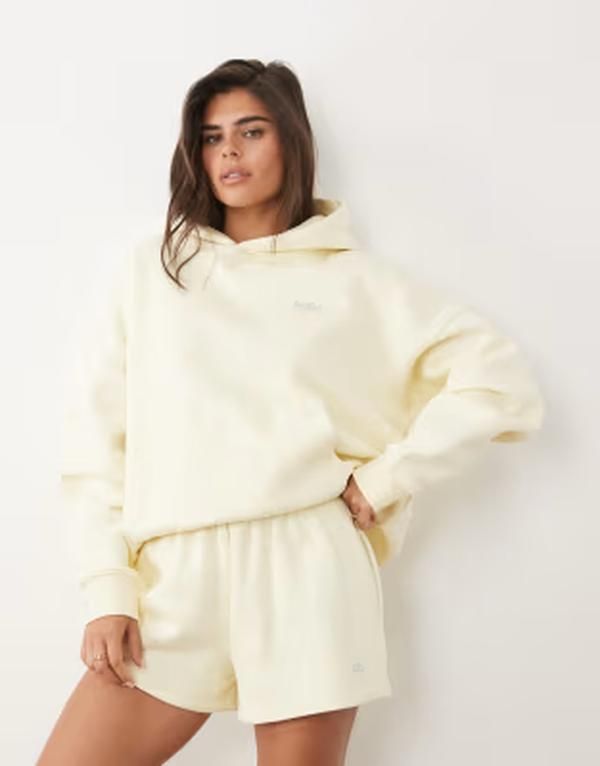 カイア レディース アウター パーカー・スウェット コットン ロゴ Kaiia cotton rich silver hardware logoversized hoodie in lemon par