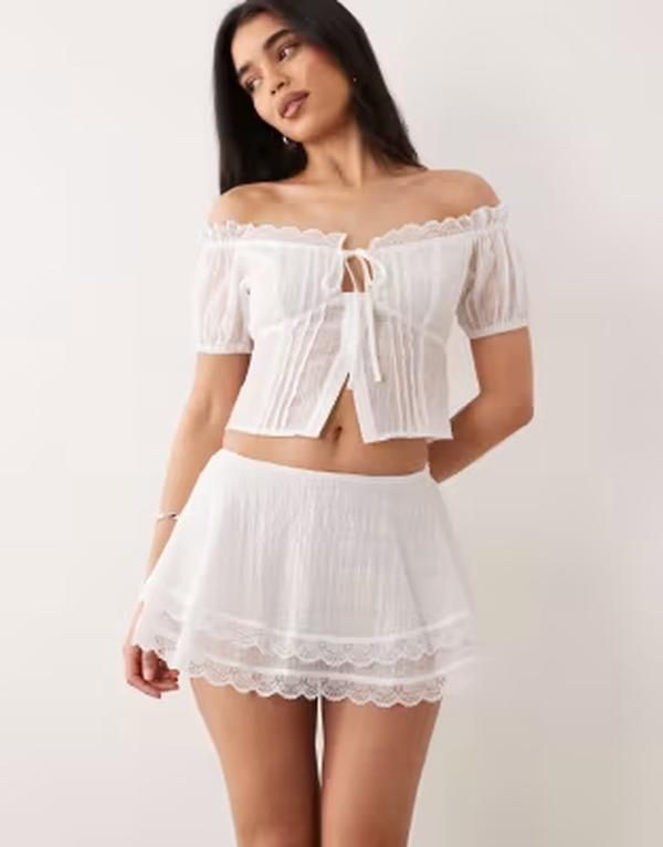 ザ・フロリック レディース ボトムスカート ティアード レーストリム ミニ レース The Frolic exclusive lace trim tie red mini frilly skirt p