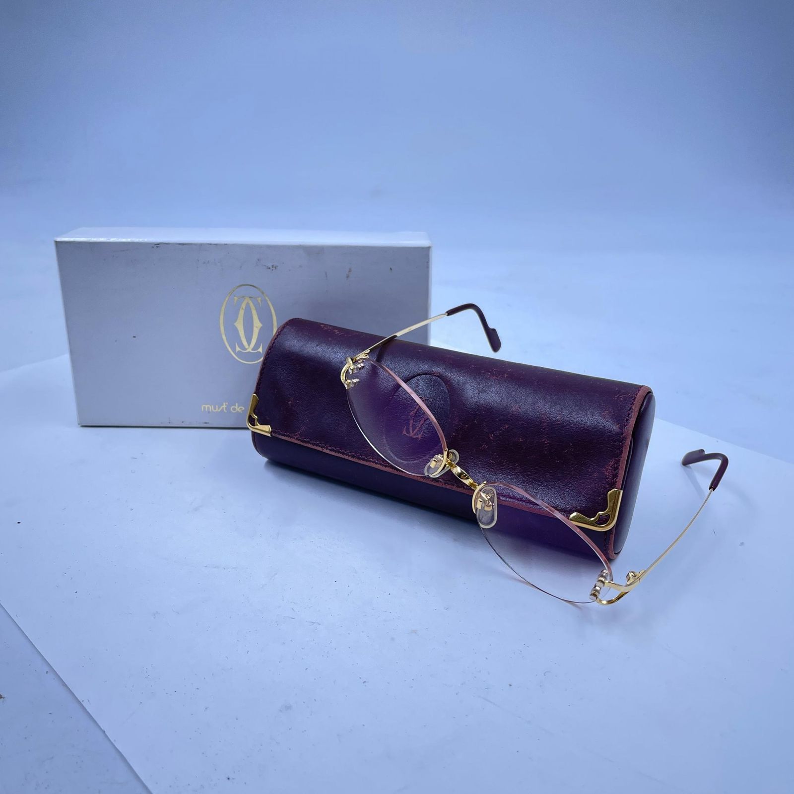 7S040CARTIER カルティエ リムレス ケース ロゴ 1719337 メガネ レディース ボルドー 中古