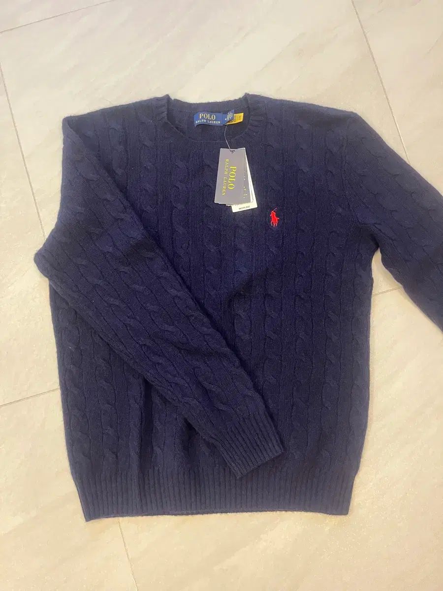 ポロ ニット 27,271円