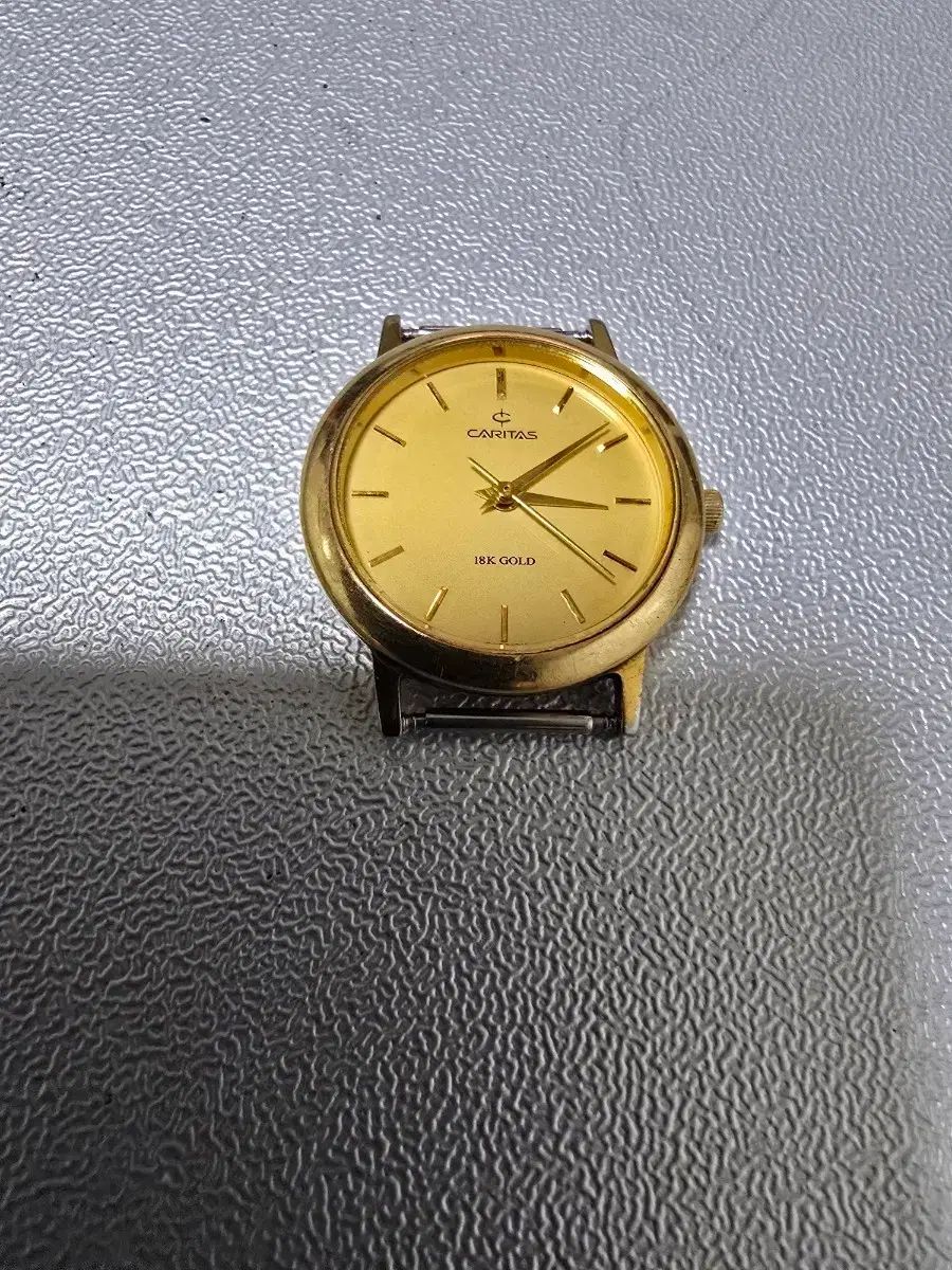 カルタス 18K リューズ ベゼル ウォッチ