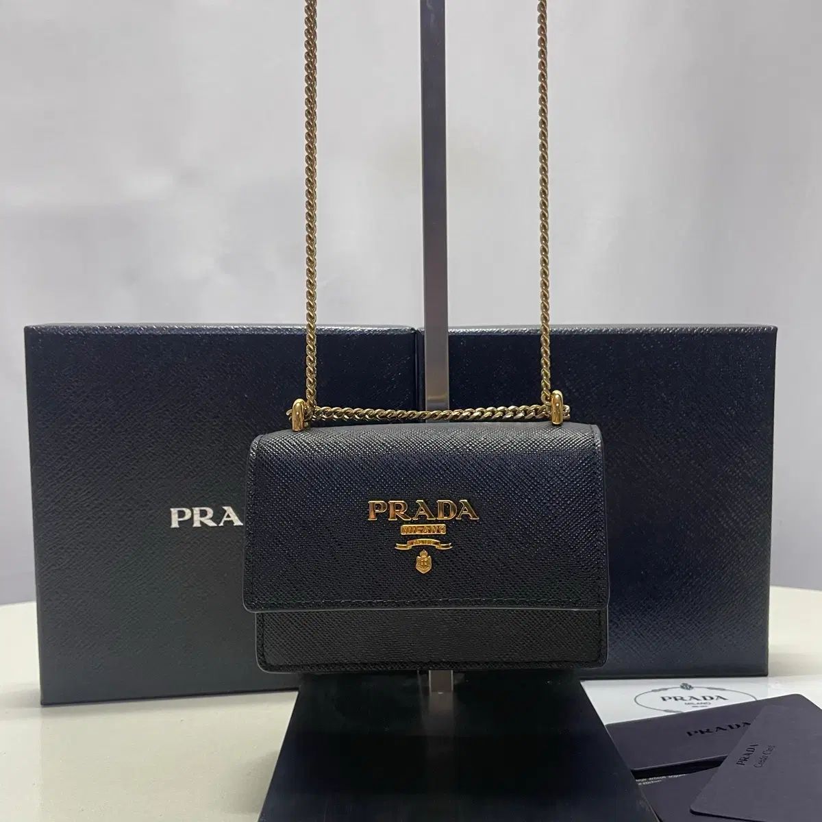PRADA プラダ サフィアーノ チェーン ミニ クロスバック 83,240円