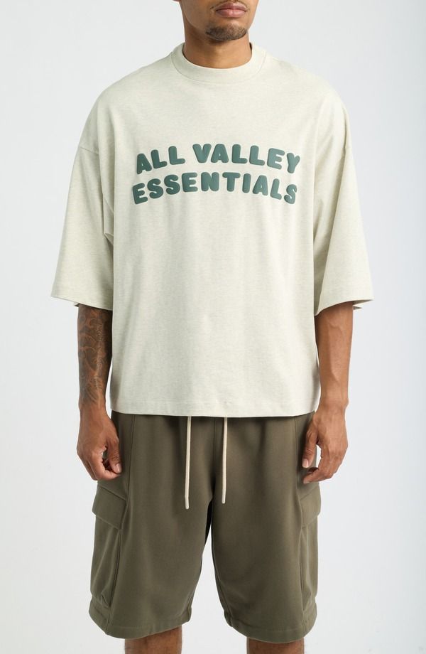 フィアオブゴッド メンズ トップス Tシャツ コットン グラフィック Fear of God Essentials Merch Graphicotton TShirt VANILLA HEATHER 22,185円