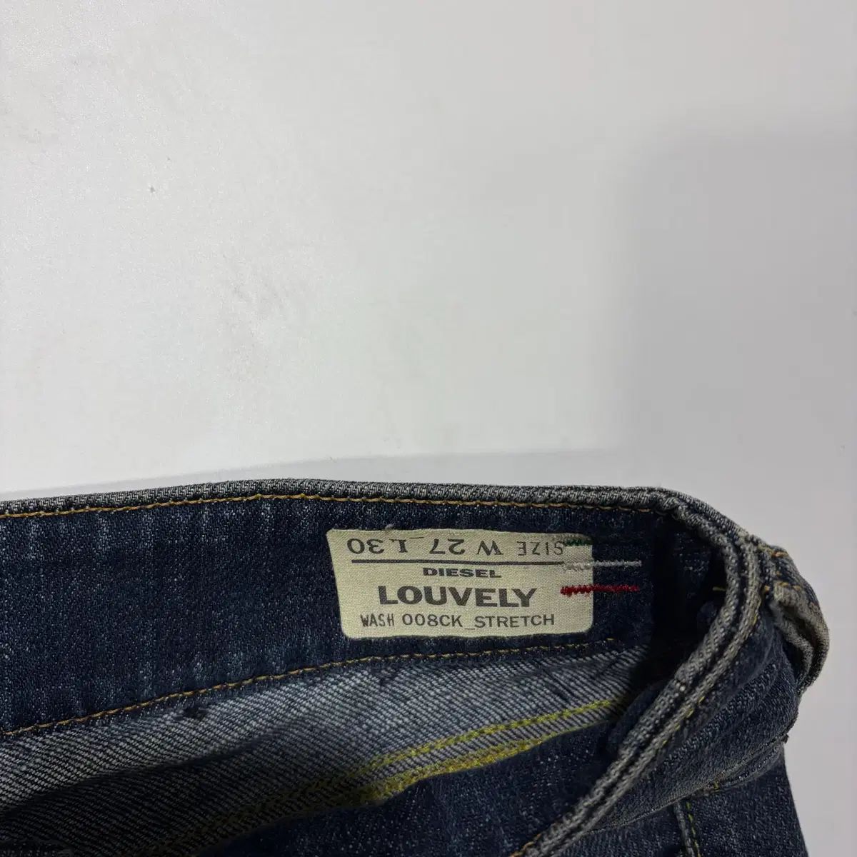 DIESEL ウォッシュ ローライズ ブーツカット デニムパンツ