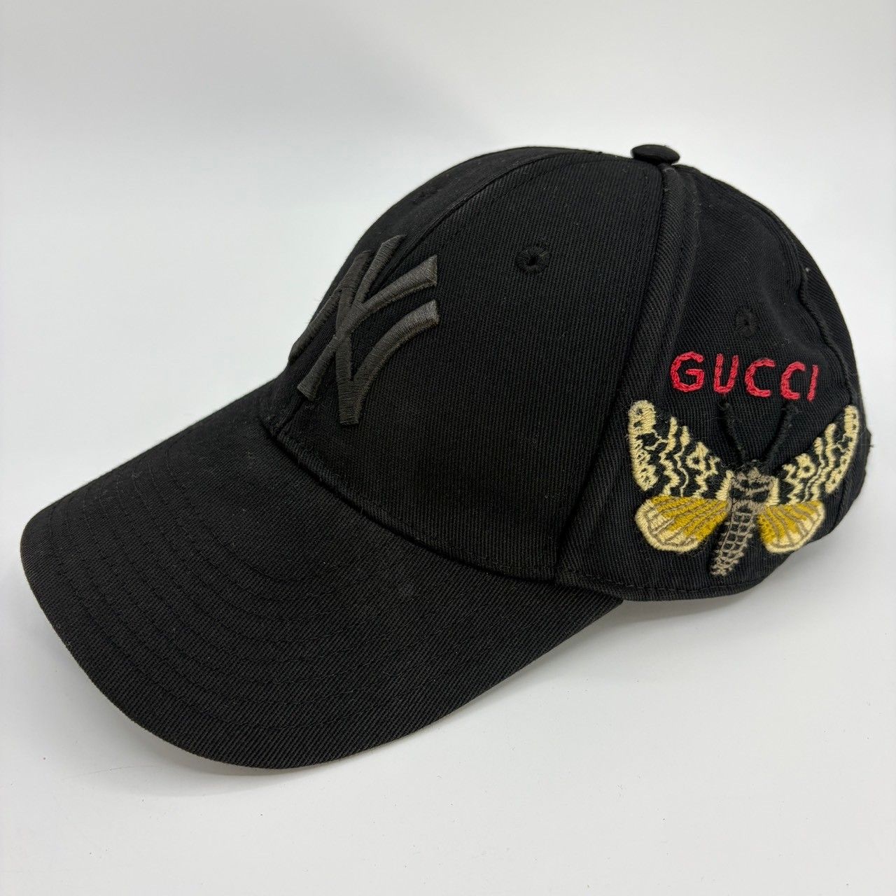 GUCCI × NEW ERA グッチ ニューエラ NYロゴ バタフライ刺繍 ベースボールキャップ ブラック 57-61cm 13,679円