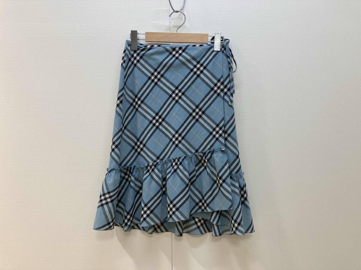 BURBERRY BLUE LABEL バーバリーブルーレーベル フリルラップスカート 巻きスカート サイズ34 水色 ノバチェック レディース シミ有り