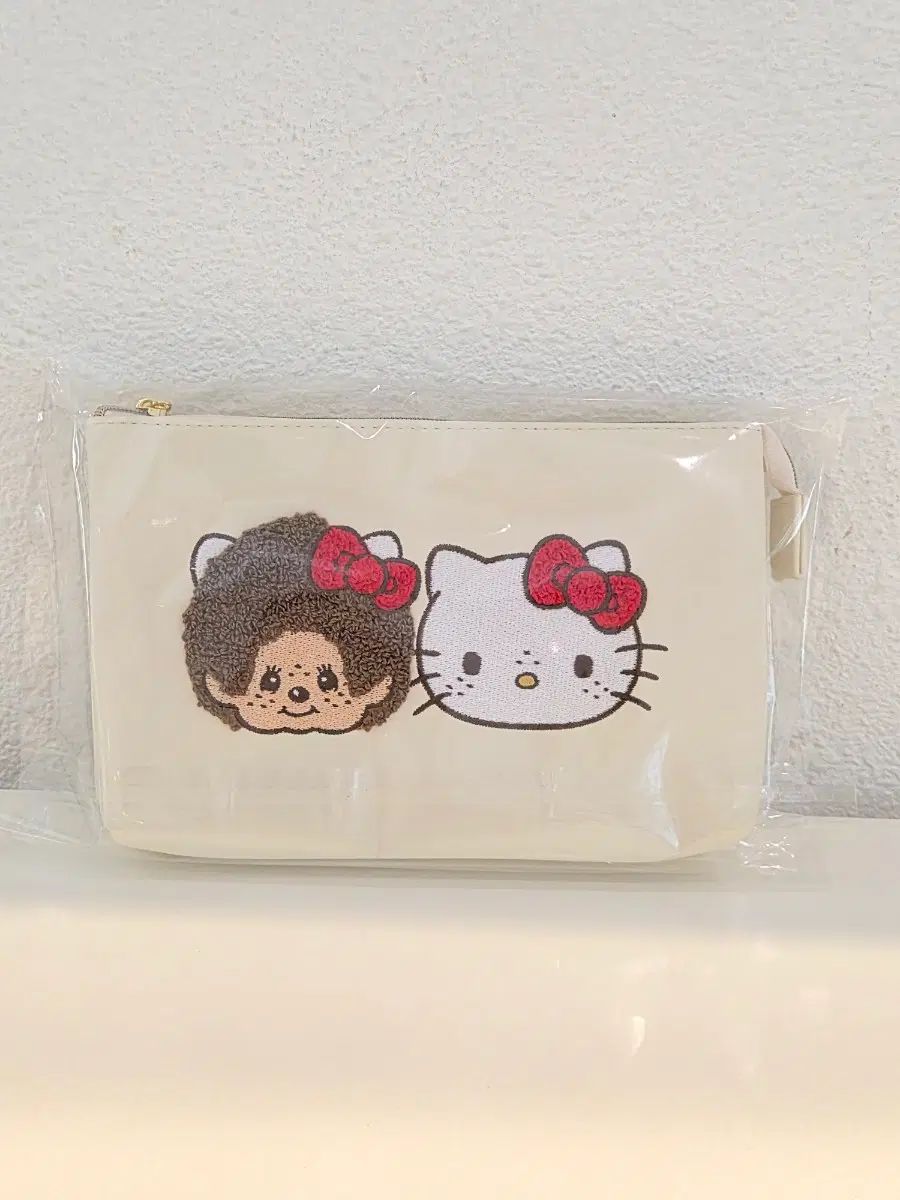 モンチッチ ハローキティ コラボ マルチポーチ