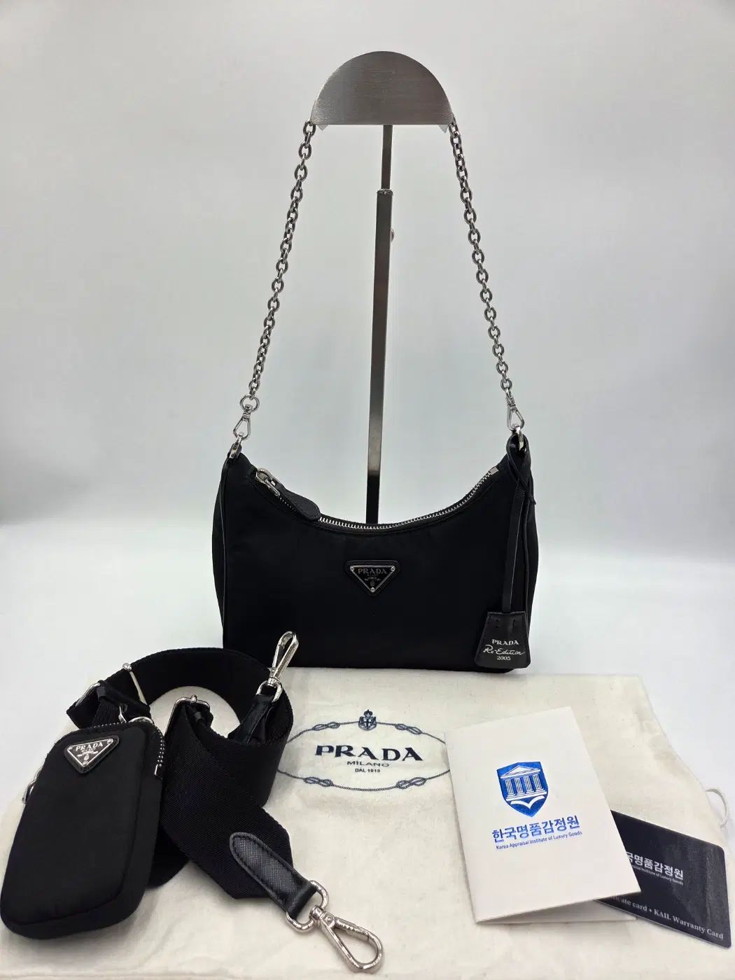 プラダ テスート チェーン ストラップ HOBO BAG ブラック 1BH204 102,522円