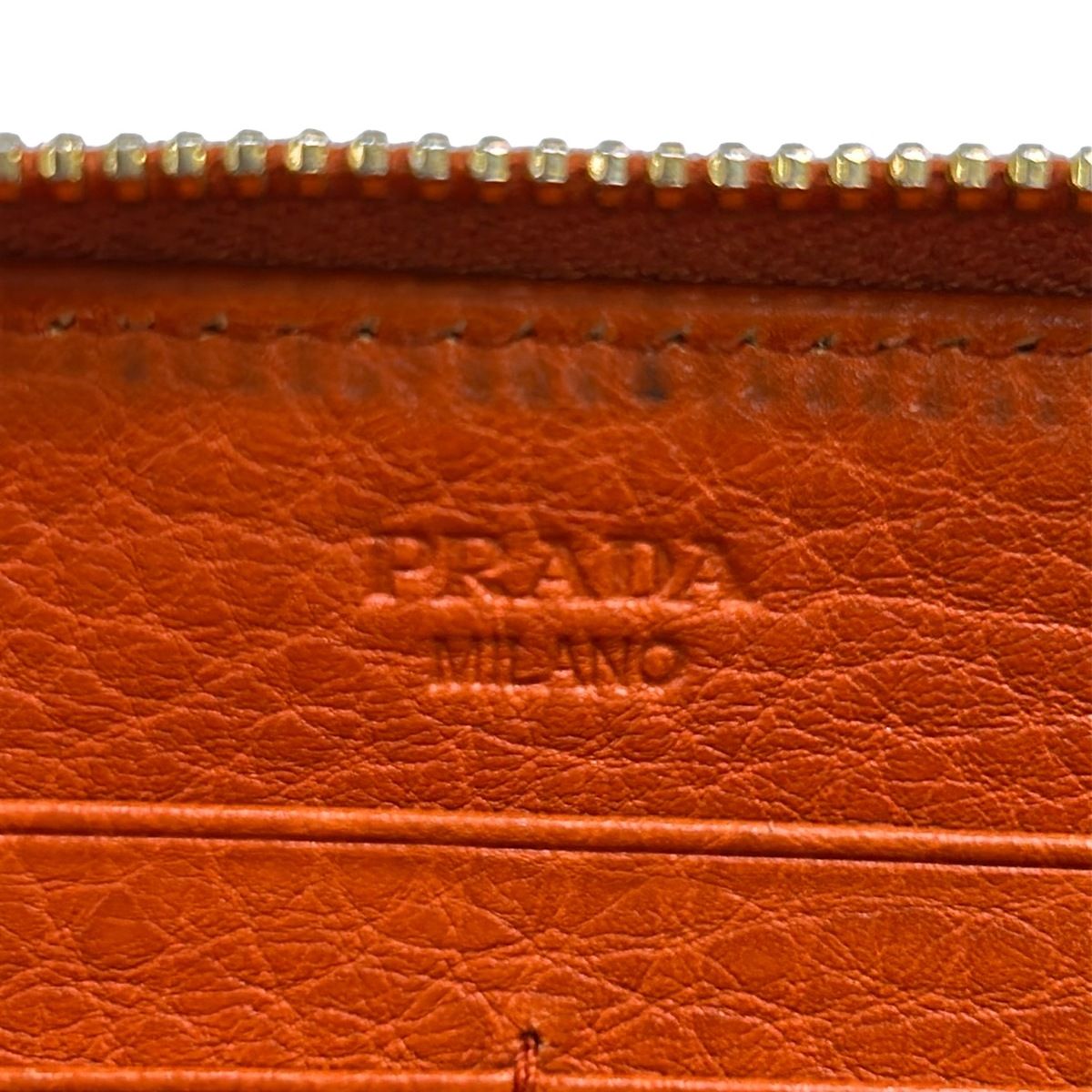 PRADA(プラダ) 長財布 - オレンジ ラウンドファスナー レザー