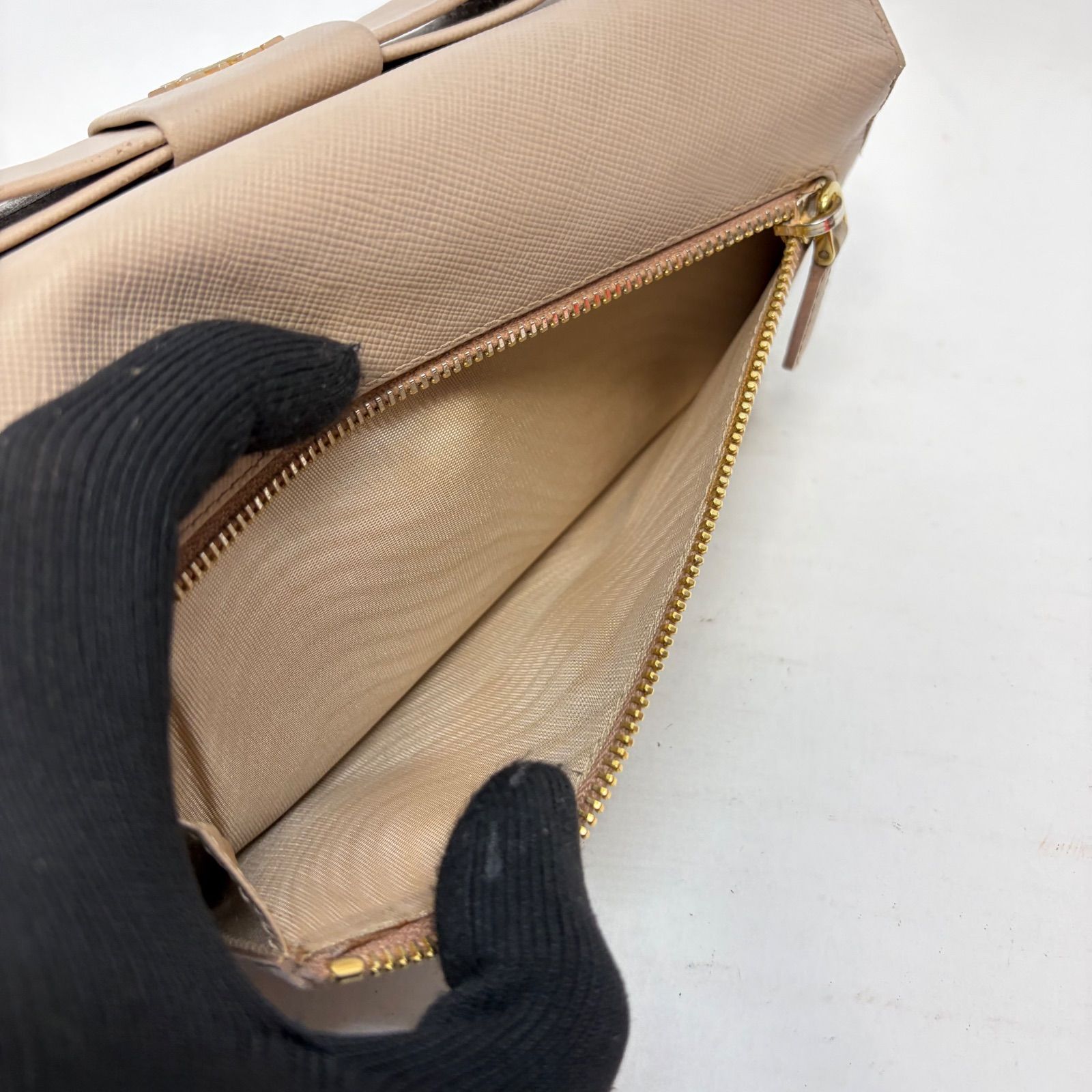 5023 PRADA プラダ 長財布 サフィアーノレザー リボン フラップ ピンク