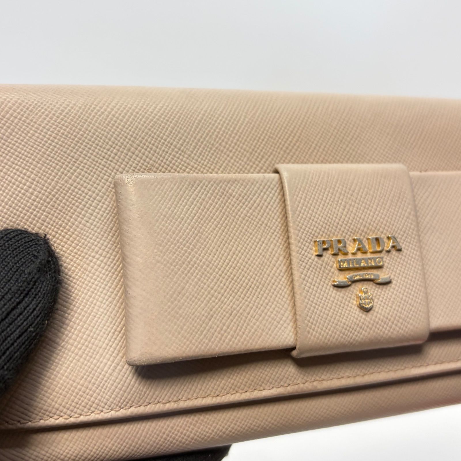 5023 PRADA プラダ 長財布 サフィアーノレザー リボン フラップ ピンク