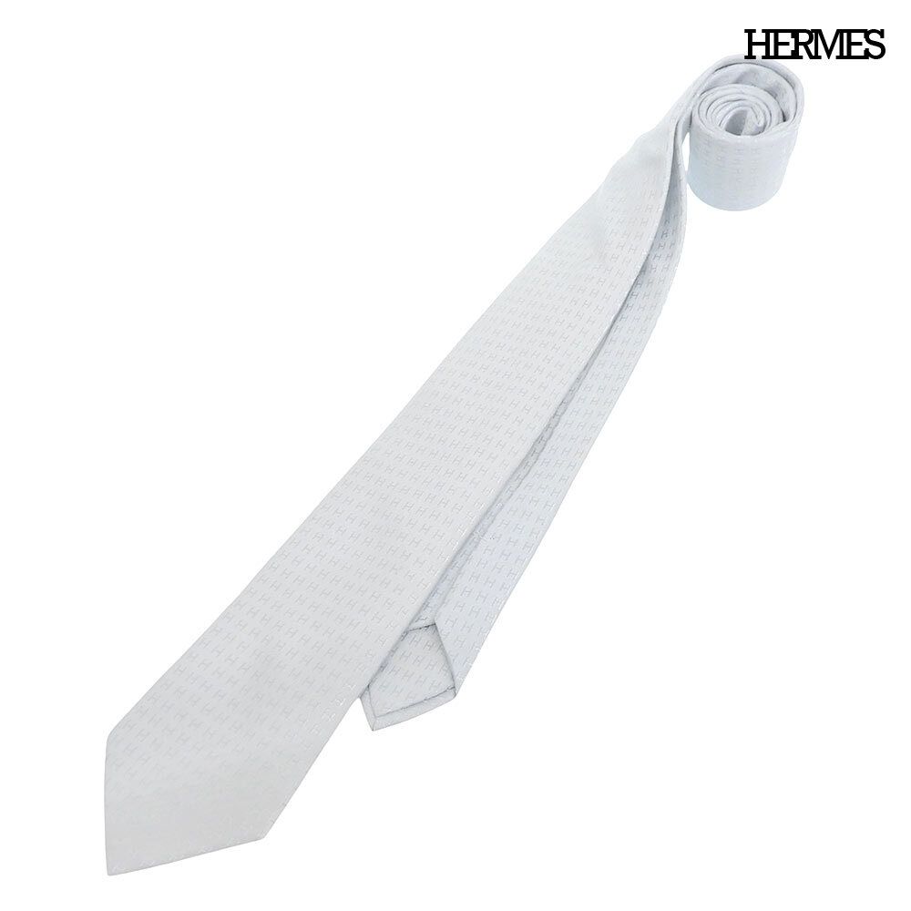 超美品 エルメス HERMES 現行 H036321T 97 ファソネ H柄 シルク ネクタイ 146cm×7cm ライトブルー 箱付き 定価42900円 メンズ