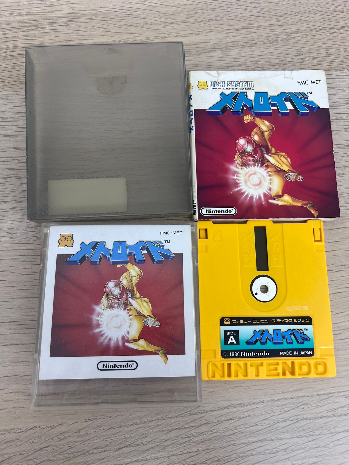 × 【ゲームソフトゲーム機】 【ジャンク品】 ファミコン ディスクシステム メトロイド ディスクカード 説明書 ケース付【5】