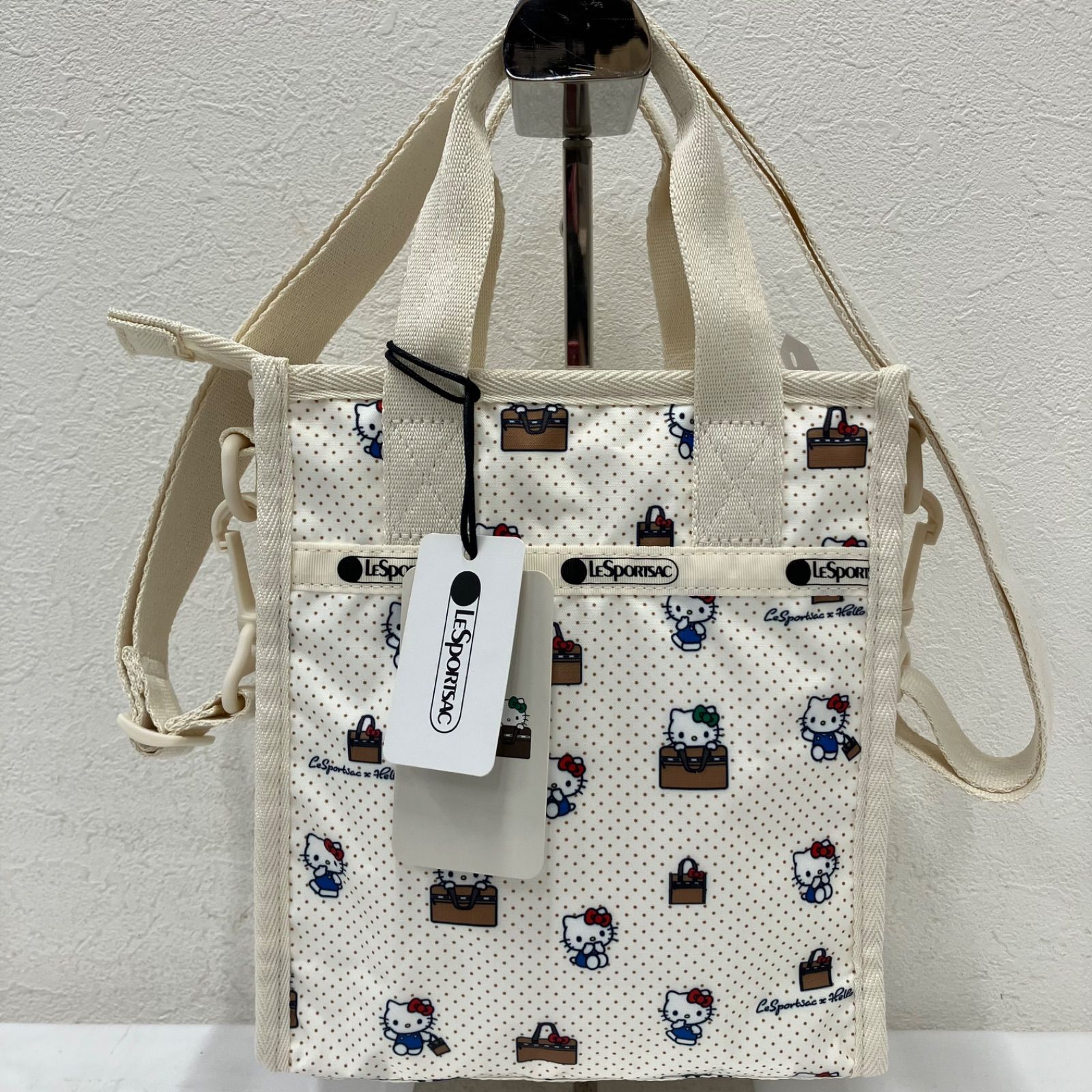 7216【美品】 LeSportsac　レスポートサック　ハンドバッグ　 2way　ショルダーバッグ　MINI N/S TOTE　 ハローキティ　50周年　コラボ　キティちゃん　 ドット　ノーバッグノーライフ　 アイボリー系　ナイロン　タグ付き　レディース