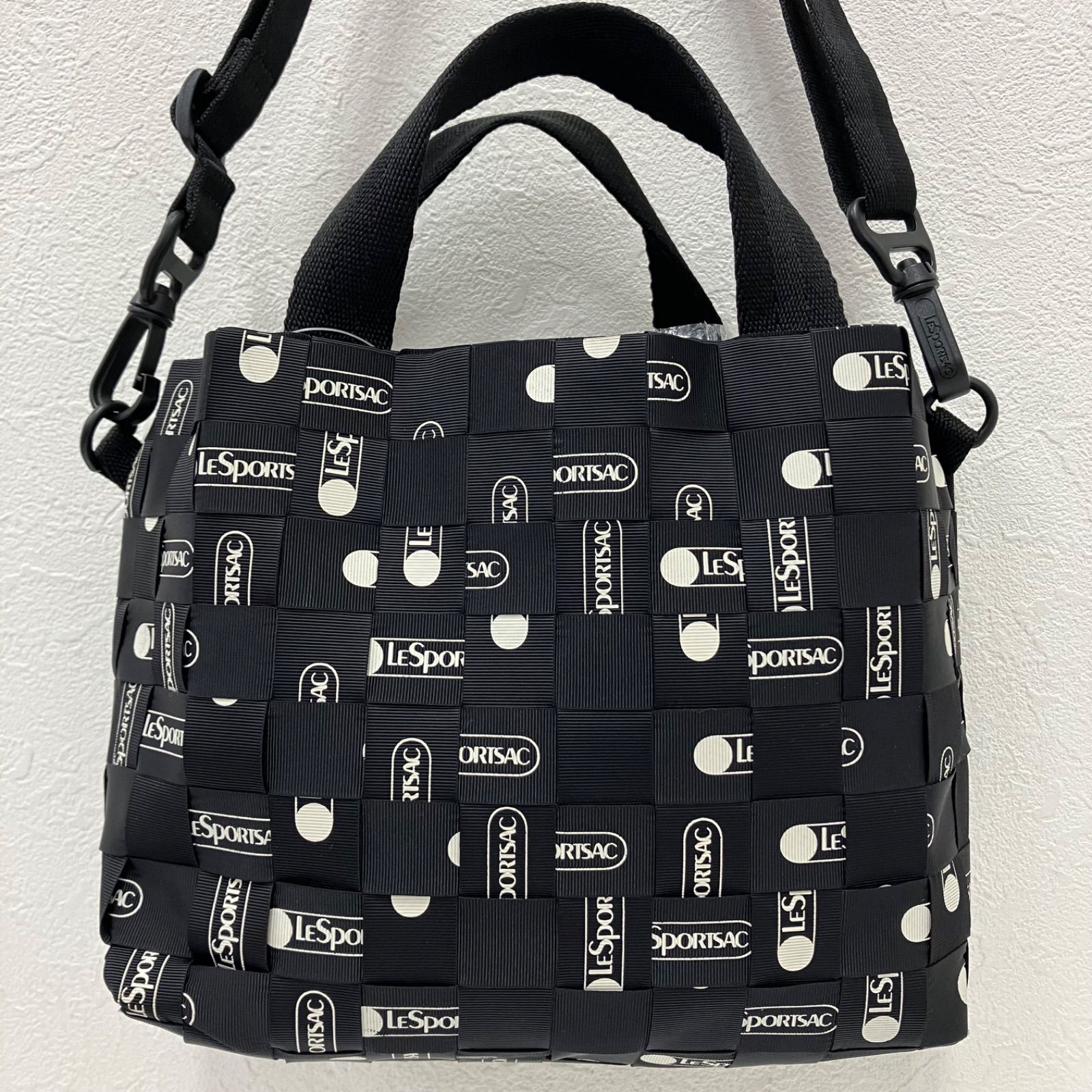7319　LeSportsac　レスポートサック　 ハンドバッグ　2way　ショルダーバッグ　 WOVEN LOGO MINI TOTE　NIGHT WEAVE　 ナイトウィーヴ　ブラック×ホワイト系　白黒　 モノトーン　編み込み　ロゴテープ　レディース