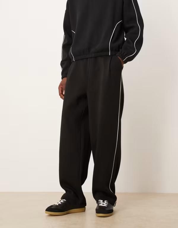 エイソス メンズ ボトムス カジュアルパンツ スウェットパンツ ASOS DESIGN super baggy sweatpants with side piping part of a set Bl 10,486円