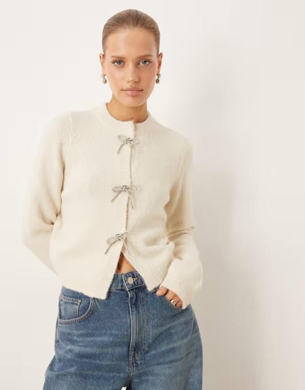 エイソス レディース アウター カーディガン ASOS DESIGN diamante bow front cardigan in cream クリーム