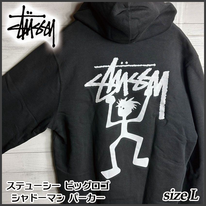 STUSSY ステューシー ビッグロゴ シャドーマン パーカー L Warrior Man 黒 ストリート 古着 バックプリント