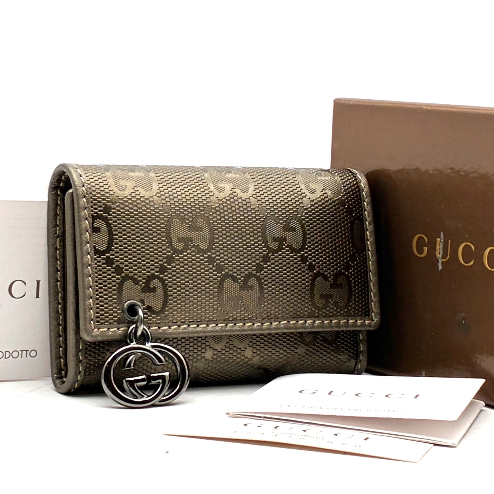 未使用保管品 廃盤 グッチ GUCCI GGインプリメ 6連 キーケース 鍵入れ インターロッキング チャーム ゴールド 金色 箱付 残暑 敬老の日 シルバーウィーク 秋休み 行楽 ハロウィン 七五三 冬のボーナス ギフト プレゼント 20,100円