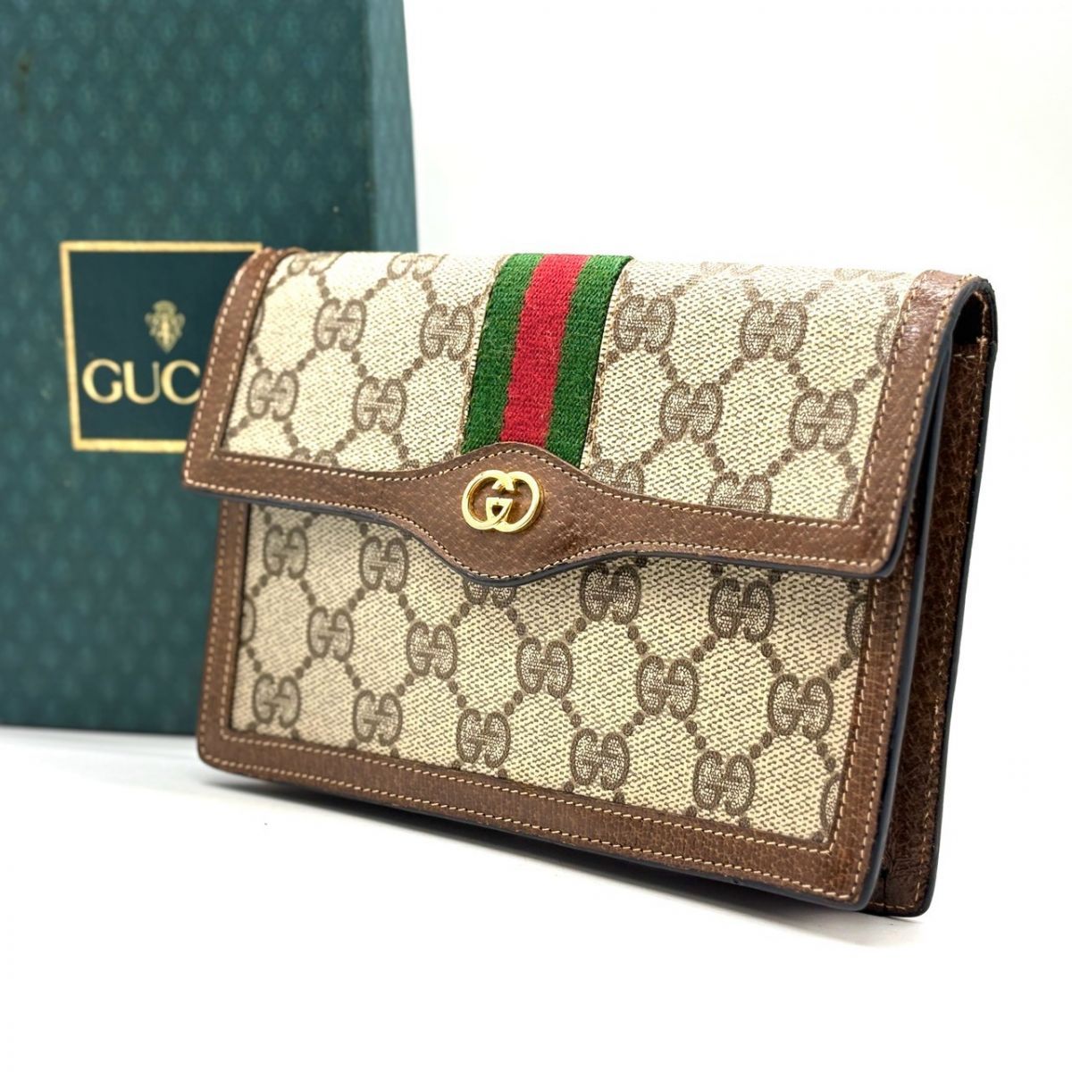 織り込まれた誇りの縞模様】 GUCCI 長財布 ポーチ GGスプリーム