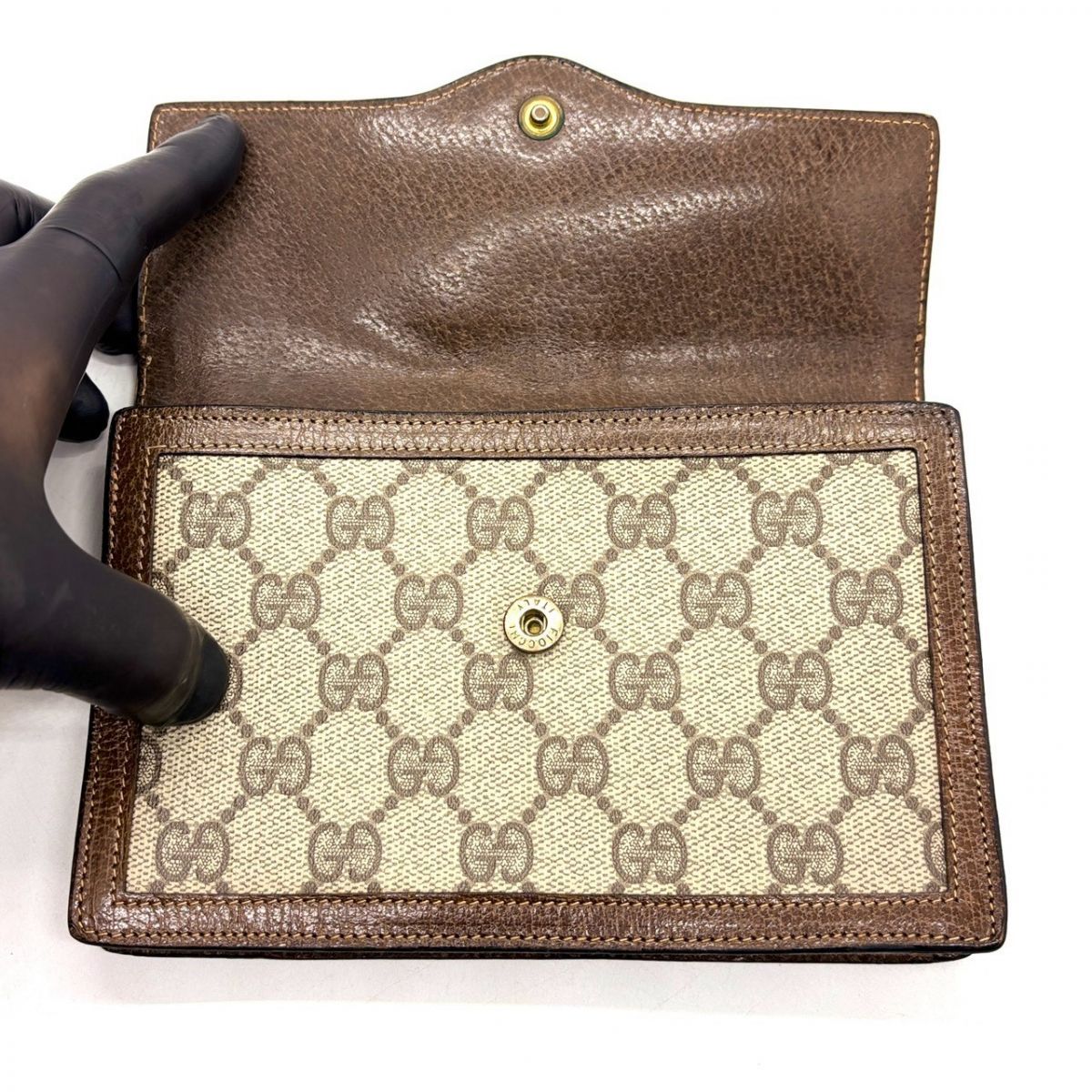 織り込まれた誇りの縞模様】 GUCCI 長財布 ポーチ GGスプリーム