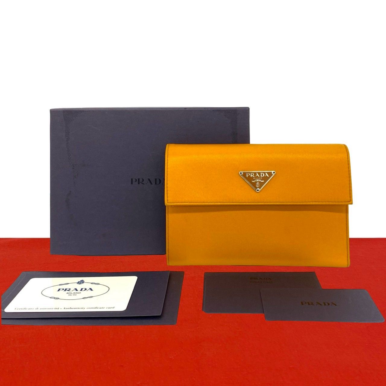 ほぼ未使用 保存箱付き PRADA プラダ 三角ロゴ プレート 金具 ナイロン 二つ折り財布 ウォレット カードケース 小銭入れ オレンジ 31807