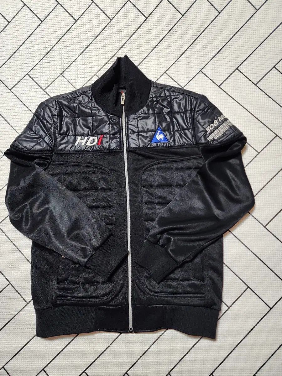 le coq sportif ルコックスポルティフレイシングジャケット