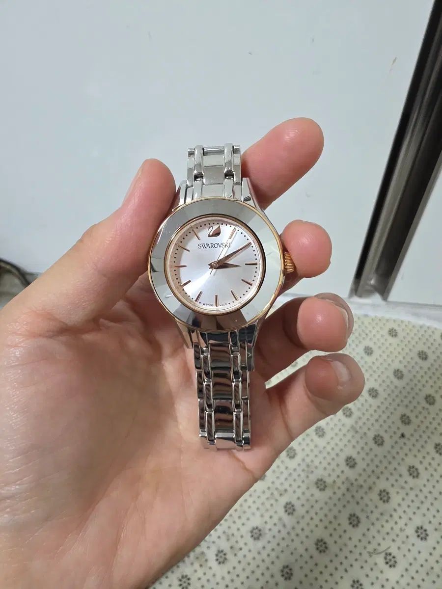 SWAROVSKI スワロフスキー レディース ウォッチ メタル シルバー ローズゴールド ベゼル