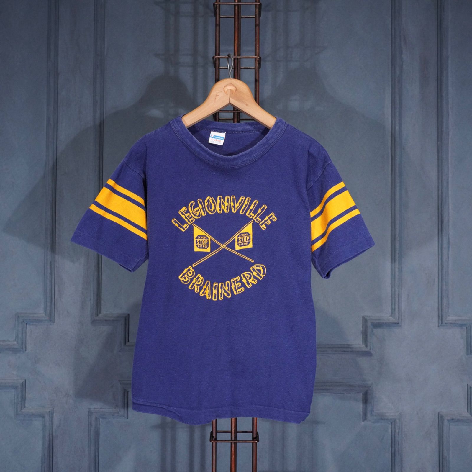 70's～80's USA VINTAGE champion LEGIONVILLE BRAINERD PRINT DESIGN FOOT BALL T SHIRT/70年代～80年代アメリカ古着チャンピオンバータグプリントデザインフットボールTシャツ