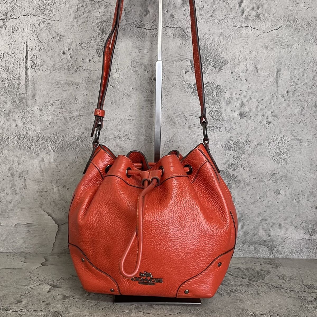 美品 COACH コーチ ショルダーバッグ 巾着型 レザー オレンジ