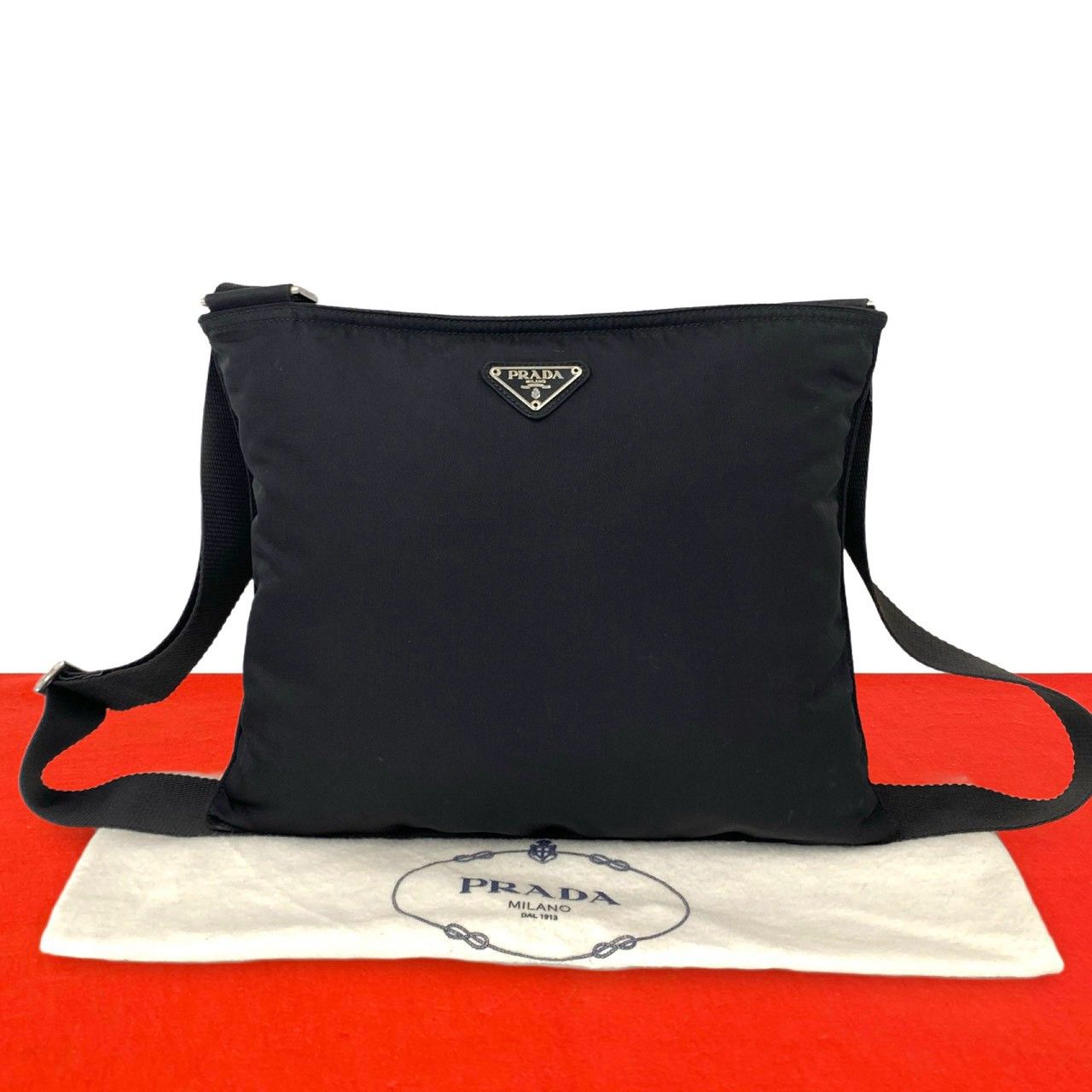 極 美品 保存袋付き PRADA プラダ 三角ロゴ プレート 金具 テスート 