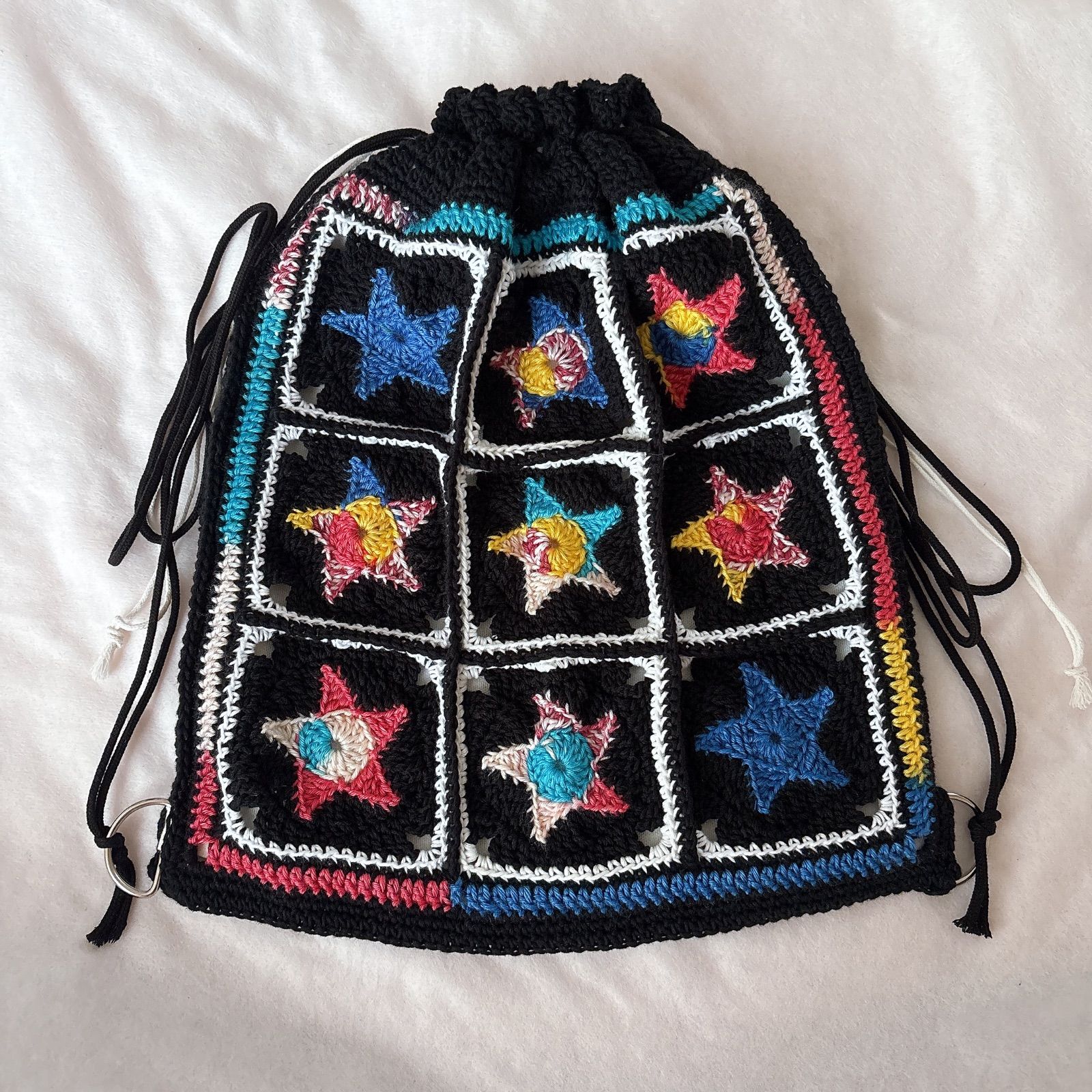 ハンドメイド・完成品】ナップサック リュック バッグ 編み物 星