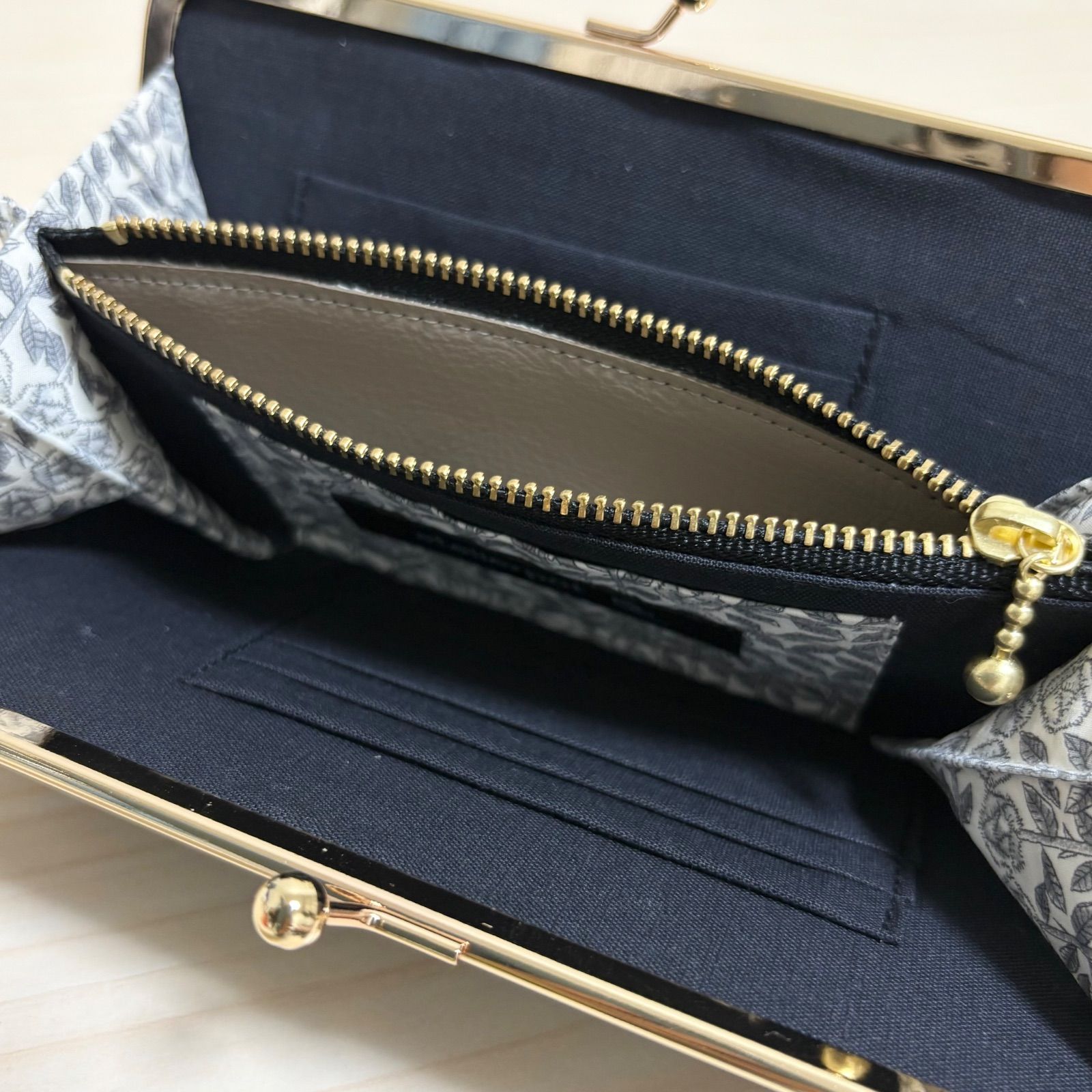 ☆ミナペルホネン☆jungle relief blackのがま口財布☆持手付 - メルカリ ☆ミナペルホネン☆jungle relief blackのがま口財布☆持手付 - メルカリ
