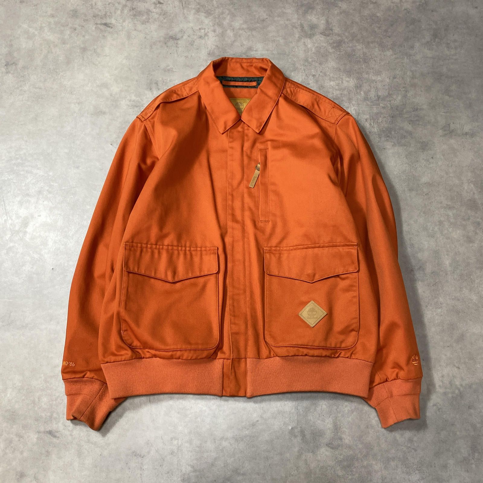 GQ6822◇TIMBERLAND : +81 3 TB0A6CPGELC1 ◇L◇オレンジ系 オールジェンダー A2 フライトジャケット 定価71500円