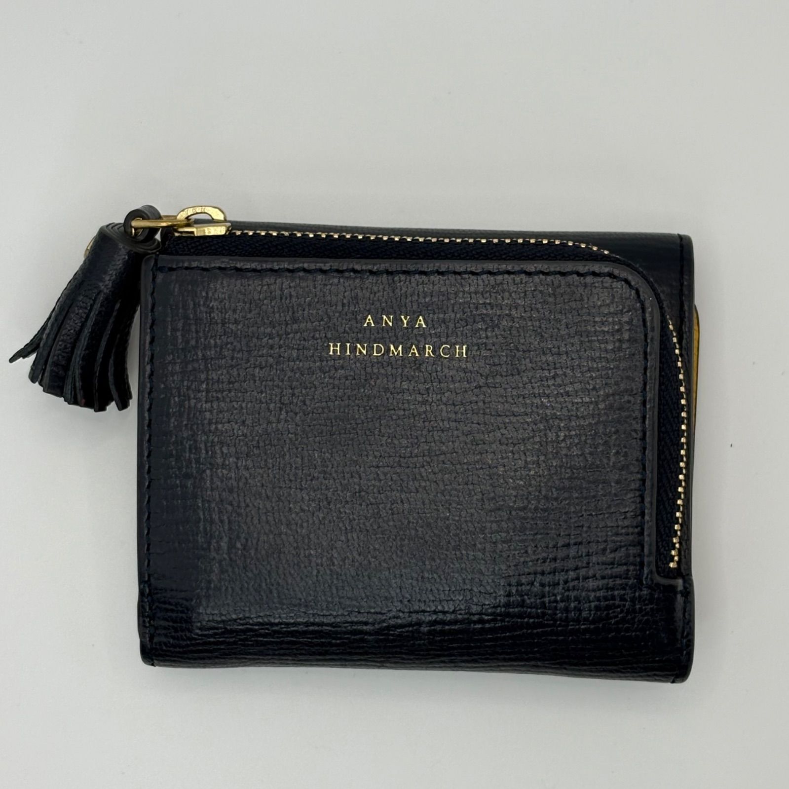 ANYA HINDMARCH アニヤハインドマーチ 三つ折り財布 ピーピングアイズ タッセル 黒 ブラック コンパクト ミニ財布 美品