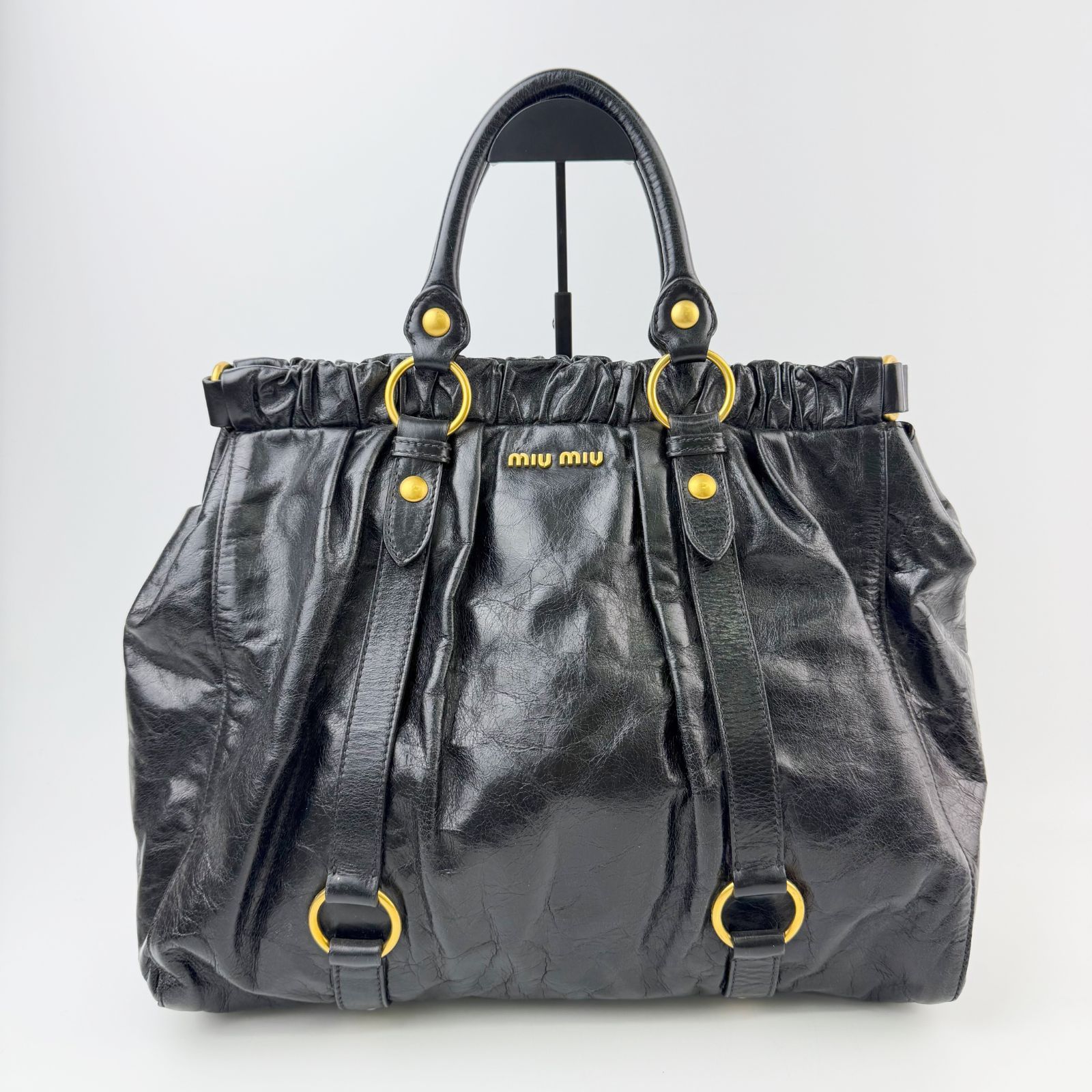 ミュウミュウ バイカー クラッチバッグ レザー ロゴ ゴールド金具 ブラック 中古】MIU MIU ミュウミュウ ロゴ ギャザー リング金具 ベルトデザイン