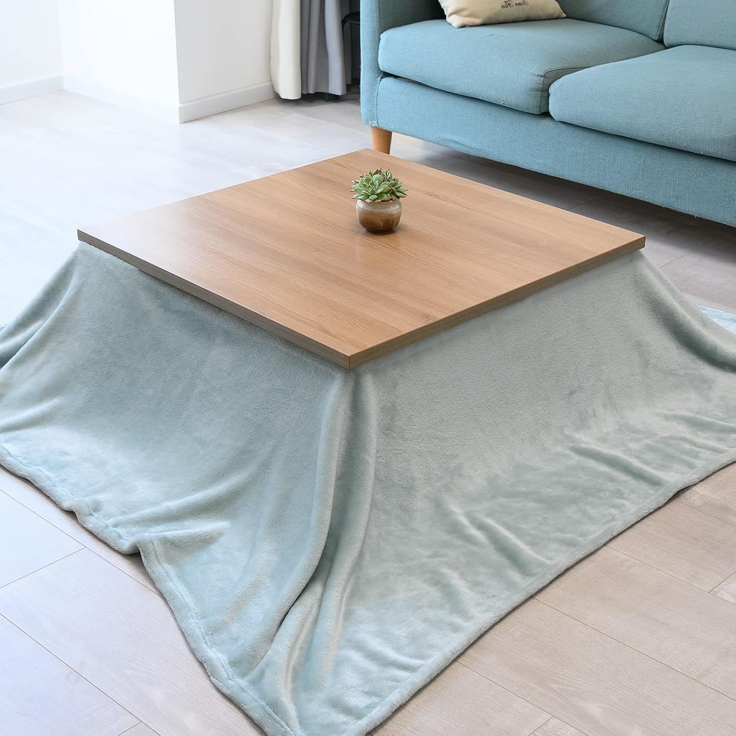 Grey checked kotatsu mid-blanket folded flat