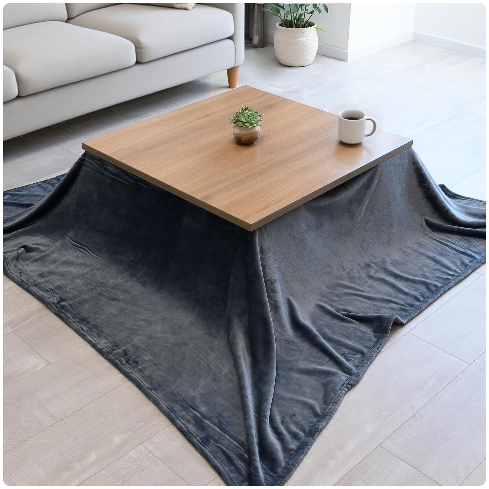 Grey checked kotatsu mid-blanket folded flat