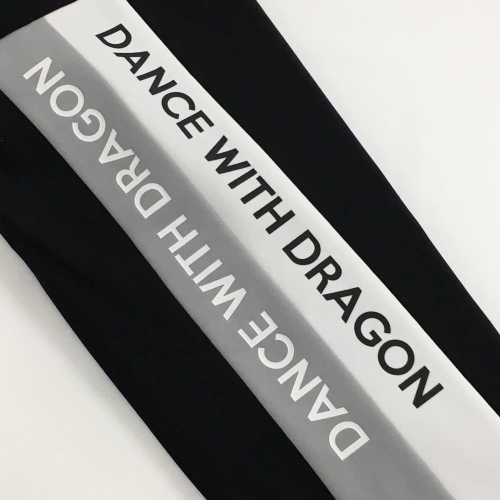 タグ付き DANCE WITH DRAGON ゴルフウエア レディースパンツ M 新品】ダンスウィズドラゴン パンツ 黒×白 裏起毛 後ろ裾ロゴ