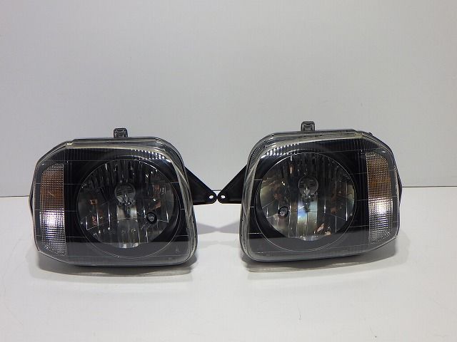 ジムニー ヘッドライト 左右 ハロゲン JB23W レベ無し 100-32647 N AZ