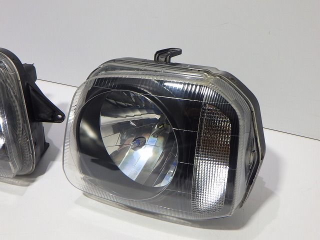 ジムニー ヘッドライト 左右 ハロゲン JB23W レベ無し 100-32647 N AZ