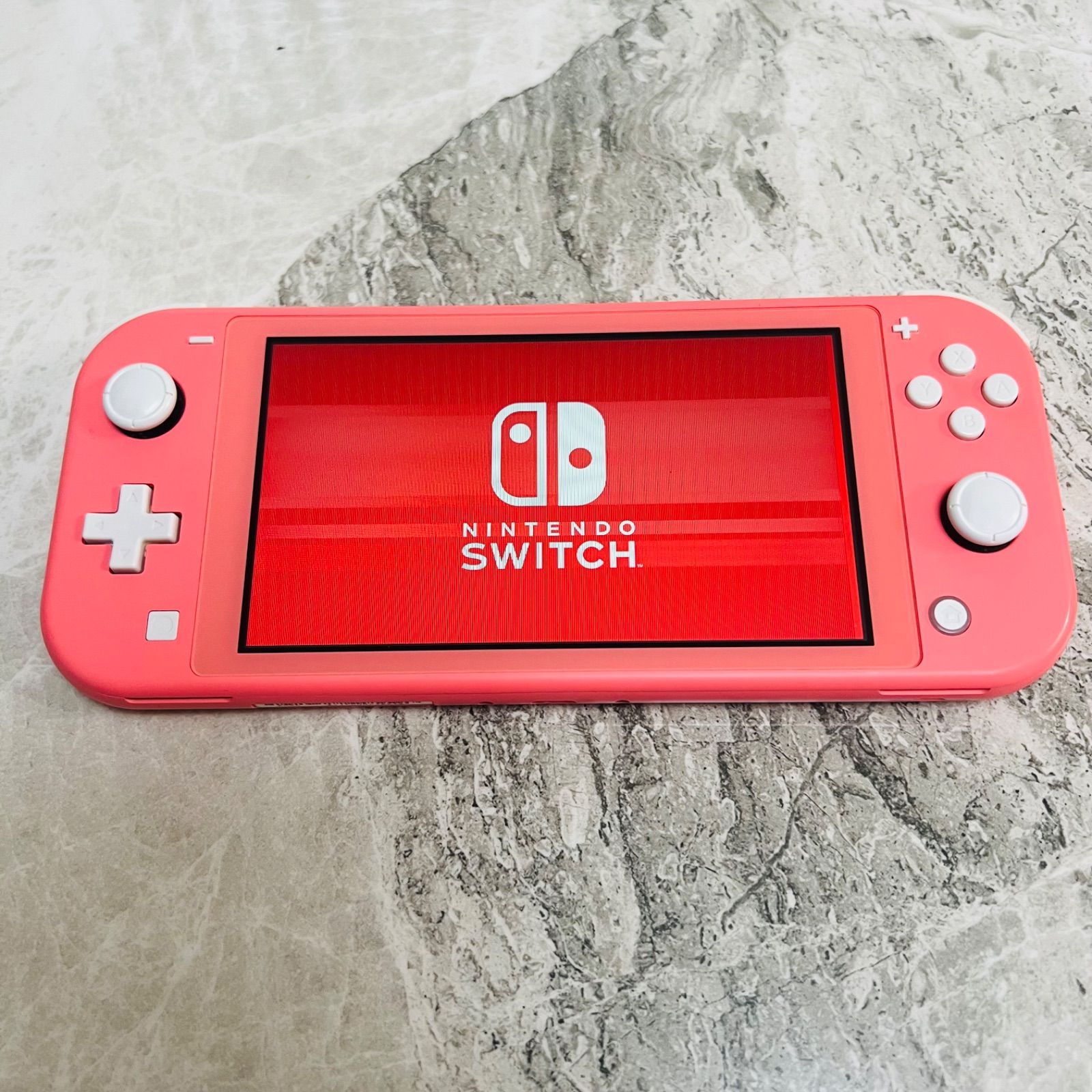 Nintendo Switch lite コーラル - メルカリ