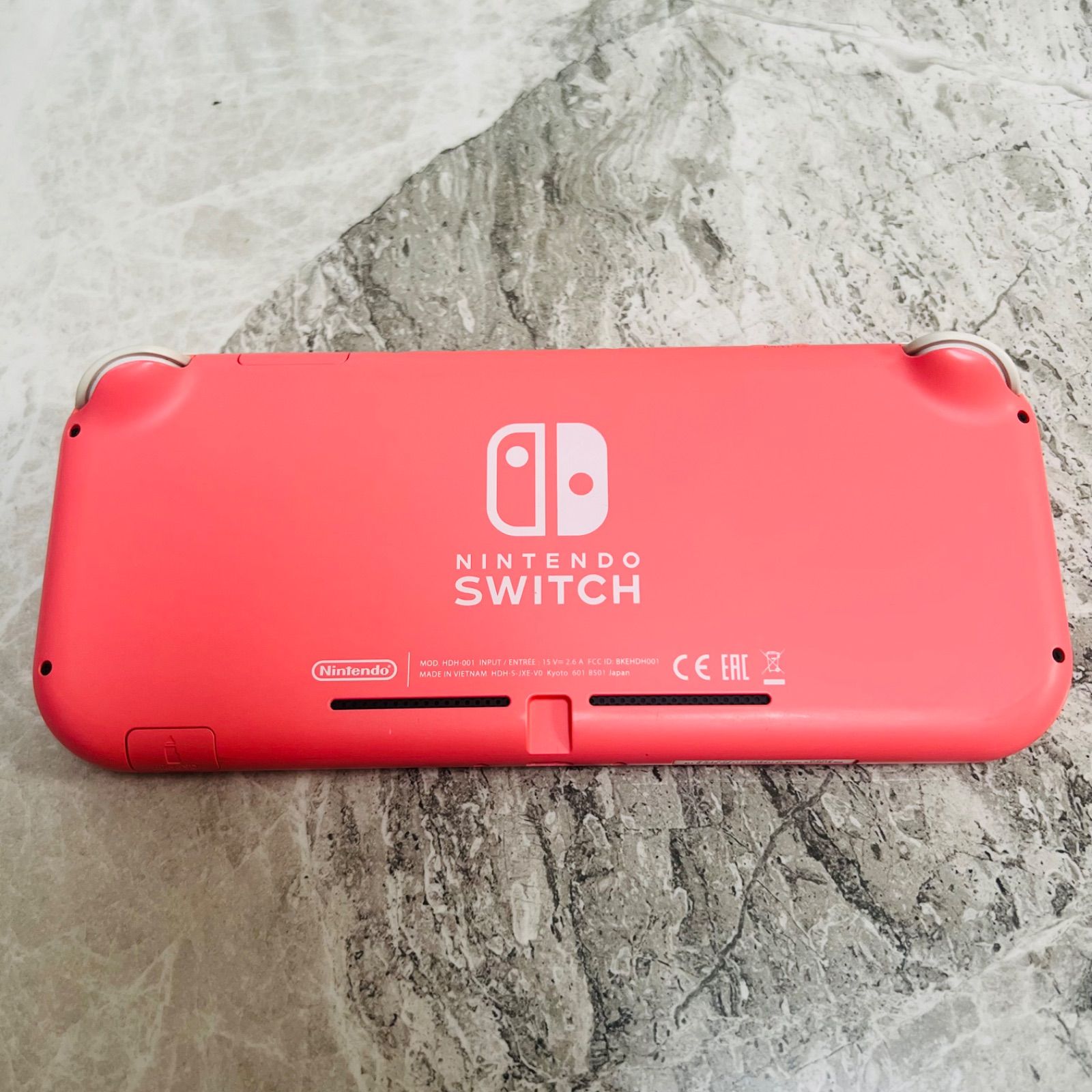 Nintendo Switch lite コーラル - メルカリ